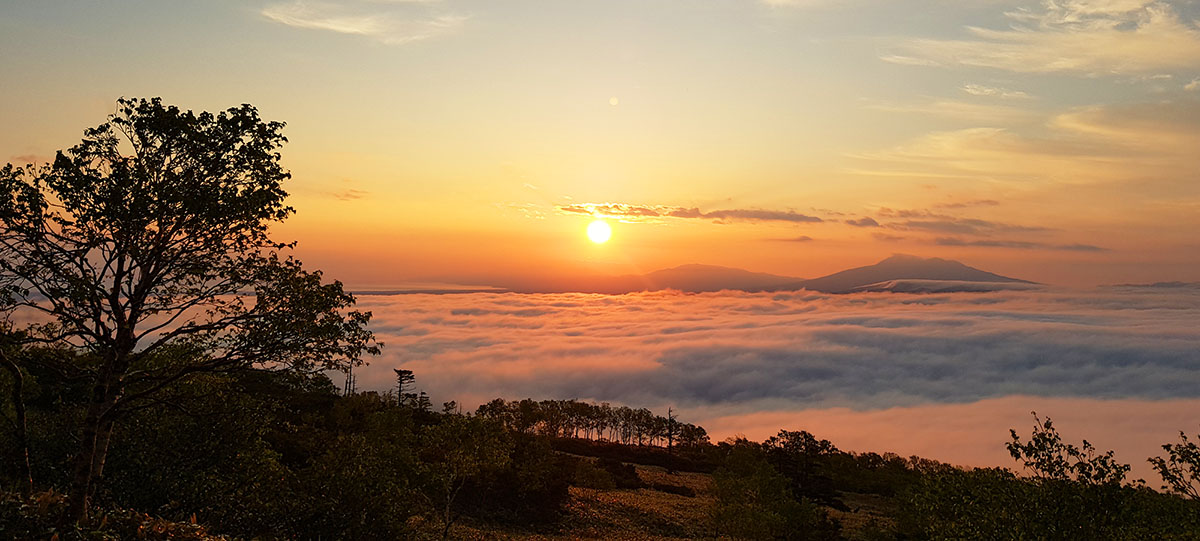 The sun rising from Mount Mokoto, Japan